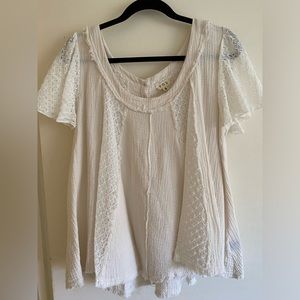 Beautiful pol top worn once to a wedding . No stains . Brand new condition.